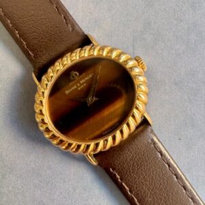 Baume et Mercier, boitier Or 18K et cadran oeil-de-tigre